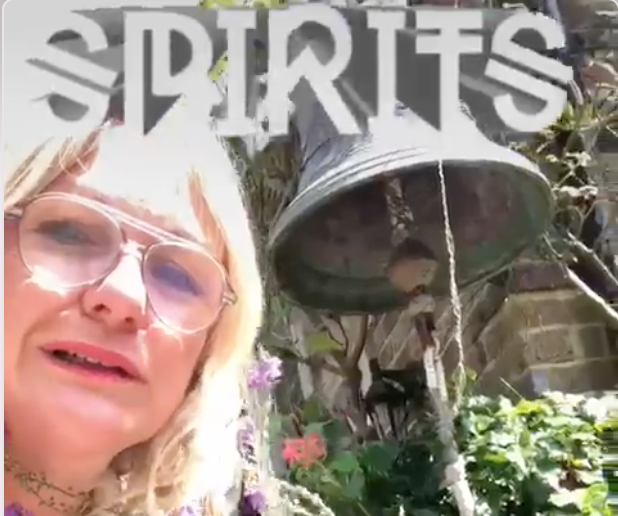 Geordie with spirits writing in garden